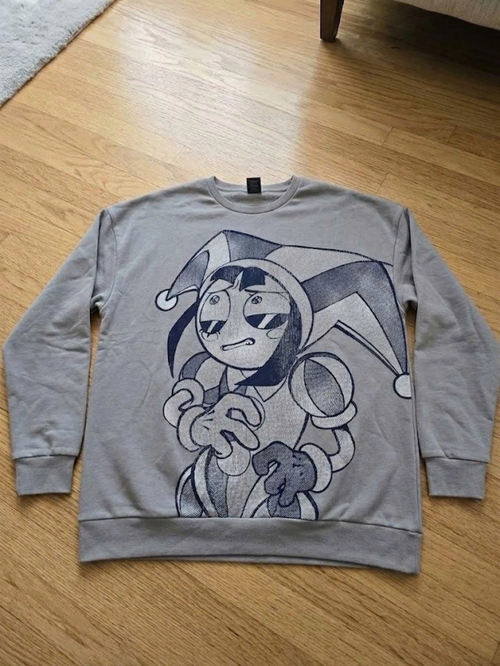 Gray Crewneck Sweatshirt with Navy Jester Illustration drake pomni